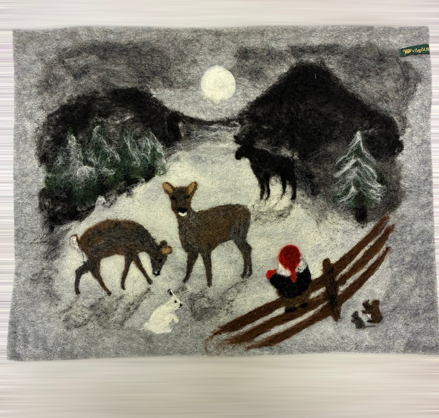 Sitteunderlag/ullbildet med nissemotiv