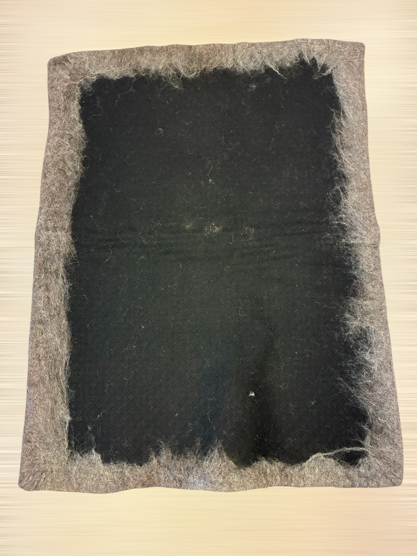 Ullmatte med ullstoff