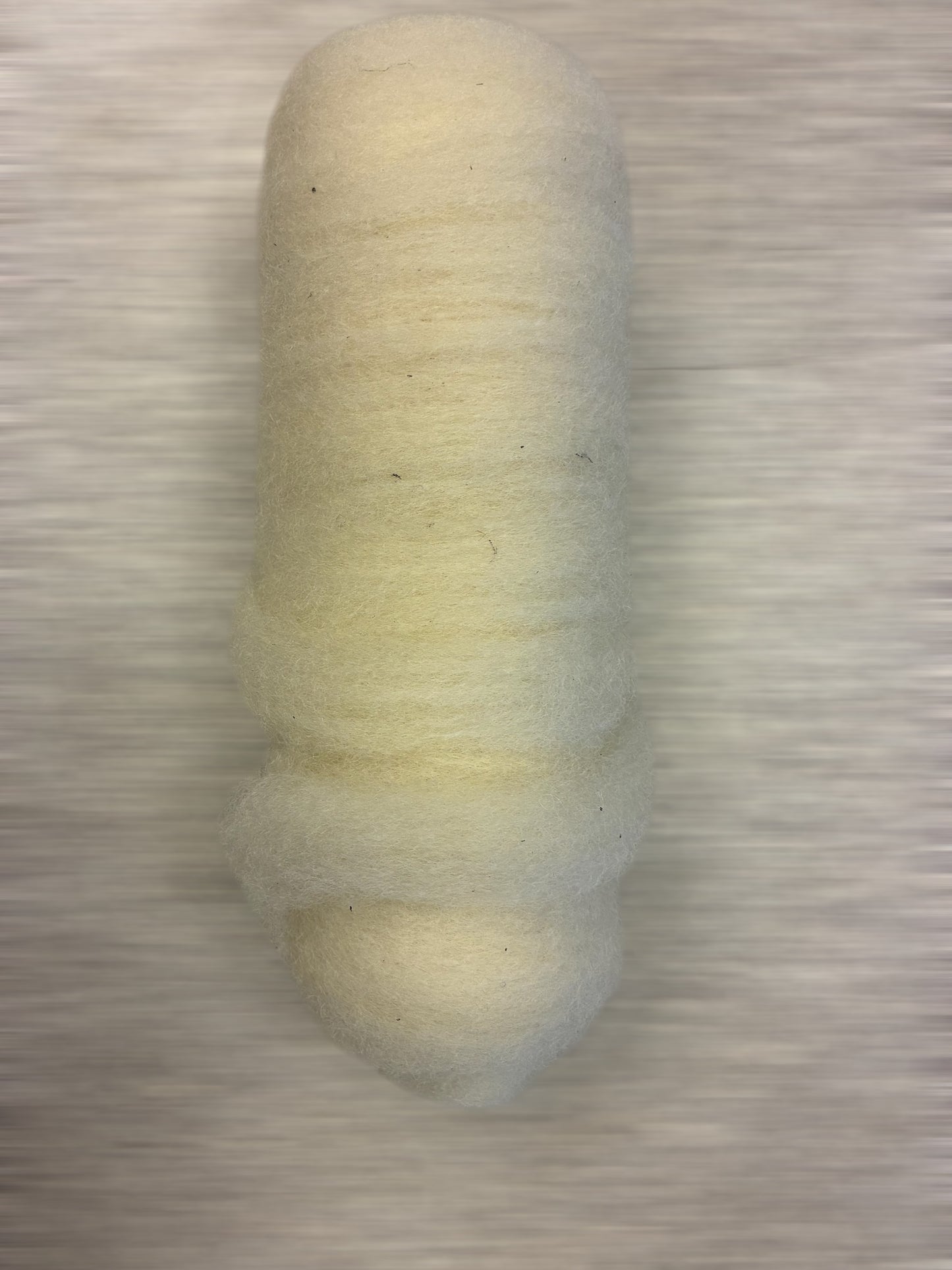 Forgarn karda av ull fra Norsk kvit sau